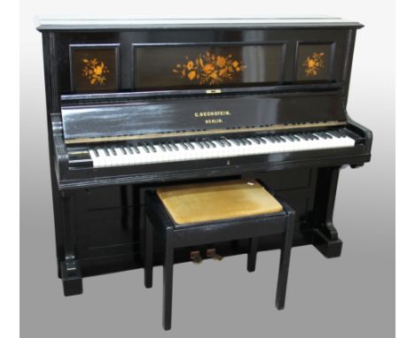 A C.Bechstein, Berlin black upright overstrung piano with stool.