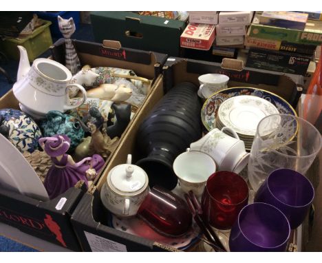 Two crates of various items including ceramic cats, flamingo dancer figurines and Royal Doulton lady as well as various teawa