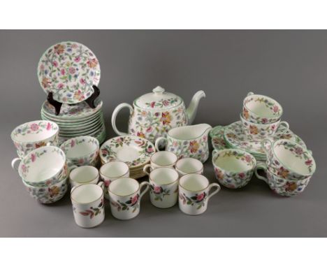 A Minton Haddon Hall thirty-one piece tea service and eight Wedgwood Hathaway Rose coffee cans and saucers (47).

