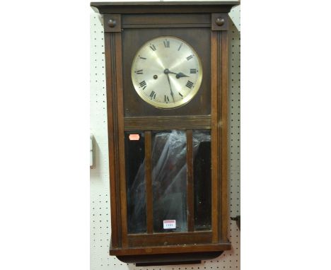 A 1930s walnut drop trunk wall clock