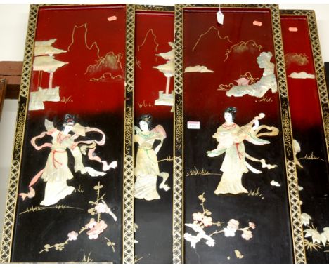 A set of four mid 20th century Japanese mother of pearl shibiyama style panels, each 90x30cm