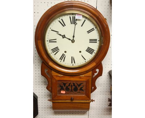 A Victorian mahogany circular dial drop trunk wall clock