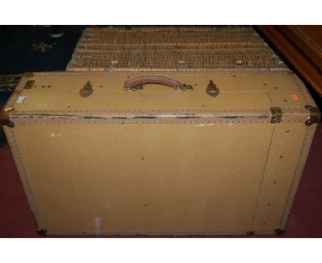 A mid-20th century Aeropack metal bound travelling trunk; together with a wicker basket (2)