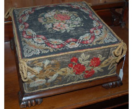 An early Victorian rosewood and floral tapestry embroidered low square section footstool 