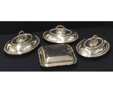 Pair of oval silver plated entrée&nbsp;dishes and covers with beadwork decoration, 12" wide; together with another similar ov