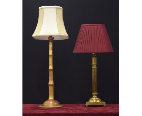 Faux gilt bamboo table lamp with shade, 29" high overall; together with a Corinthian style brass table lamp with a pleated bu