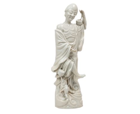 A DEHUA STANDING FIGURE OF LIU HAI, QING DYNASTY, 17-18TH CENTURY, PROVENANCERobert McPherson, London (according to label) th