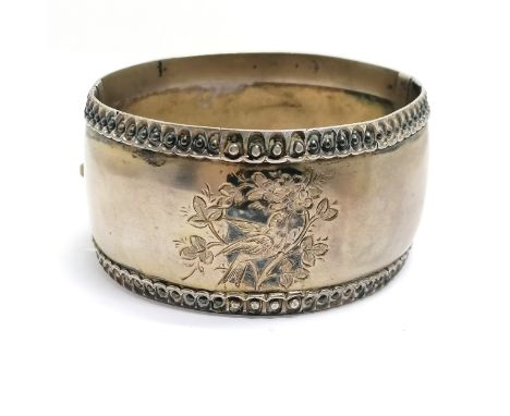 Antique Victorian unmarked silver bangle with bird floral detail &amp; registration diamond mark - 6.5cm internal x 3.5cm wid