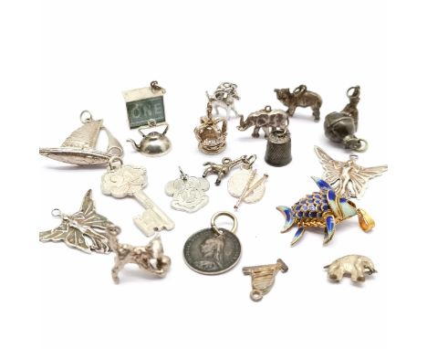 Qty of silver charms inc Disney Minnie Mouse, Art Nouveau style butterfly lady, £1 note, enamel articulated fish etc - total 