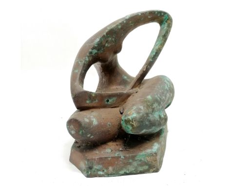 Abstract bronze sculpture of a seated figure with surface verdigris - 25cm high x 23cm across