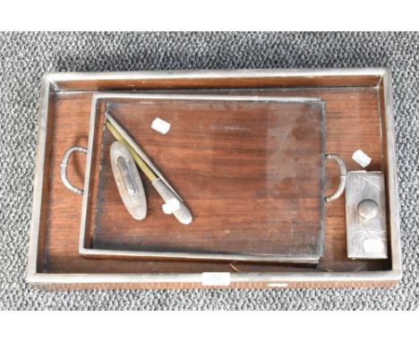 A Japanese Meiji period white metal mounted hardwood tray, of plain rectangular form with short bracket feet (one af), 48.5cm