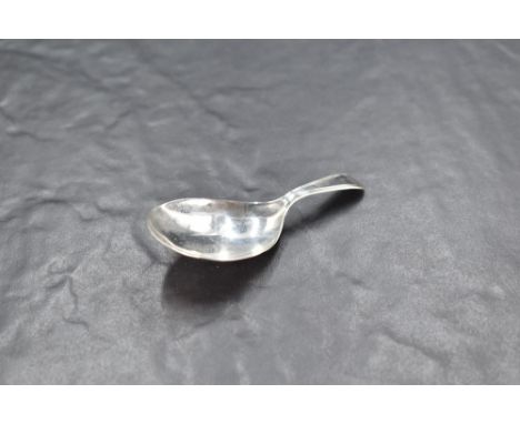 A George III silver caddy spoon, having an oval bowl and string moulded handle, marks for London 1799, maker Edward Mayfield,