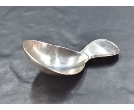 A George III silver caddy spoon, nicely proportioned with oval bowl and short moulded handle, marks for 1799, maker indistinc