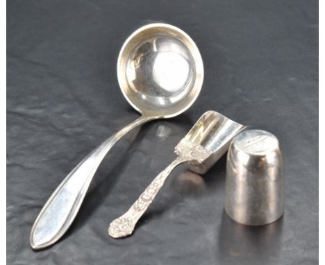 A 20th century Dutch white metal sauce ladle, of moulded and tapering form, marks for 2nd standard and key mark indicating ma