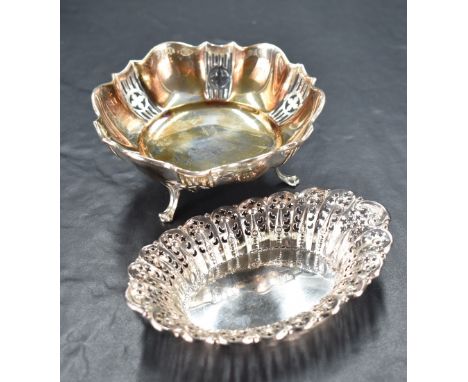 A George VI silver dish, of shaped circular form with pierced decoration and raised on out-swept legs, marks for Sheffield 19