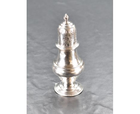 A George V silver pepperette, of dredger form with pierced finial topped cover over the moulded body and moulded conical foot