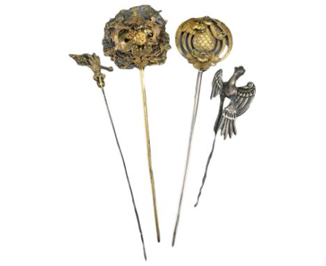 GROUP OF CHINESE GILT SILVER HAIRPINS, LATE QING DYNASTY. To include a phoenix roundel, a butterfly on a flower head with 'sh