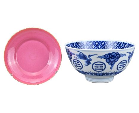 A CHINESE PORCELAIN BOWL AND SAUCER. To include a Chinese blue and white porcelain bowl decorated with phoenixes and clouds a