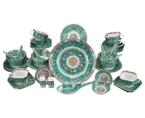 A CHINESE VINTAGE PORCELAIN PART DINNER SERVICE, EARLY 20TH CENTURY. Decorated with bok choy and butterflies with with floral