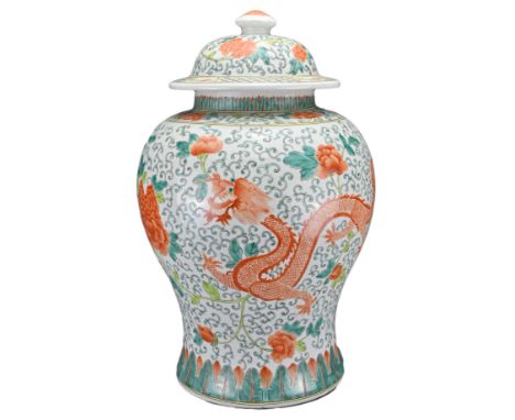A CHINESE FAMILLE VERTE DRAGON & PHOENIX JAR WITH COVER, 20TH CENTURY. Of baluster form decorated with a dragon, phoenix and 