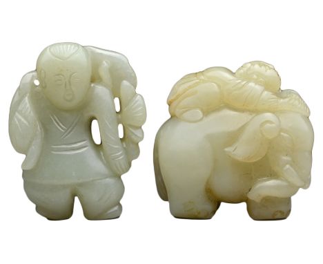 TWO CELADON JADE CARVINGS. To include an elephant with a boy on its back and a boy holding a lotus branch. Elephant 4cm x 4.5