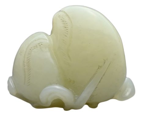 A CHINESE PALE CELADON JADE CARVING OF PEACHES. Carved in relief with two beaches sat on a leafy branch. 5cm x 4cm. 