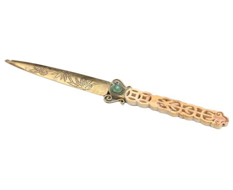 A CHINESE BRASS LETTER OPENER, 19/20TH CENTURY. With pierced ivory handle and inlaid jade stone. 18.5cm length.Overall good g