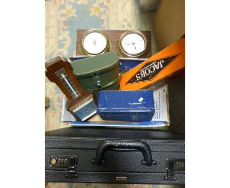 Box of Collectables including Barometer, Tins, a Pair of Greenkat Binoculars and a Pierre Cardin Briefcase