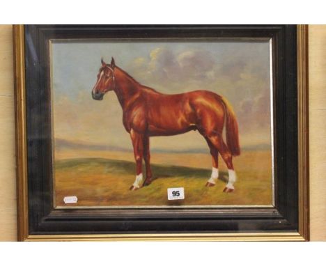 A Gilt Framed Oil Painting Portrait of a Thoroughbred Horse on open ground 