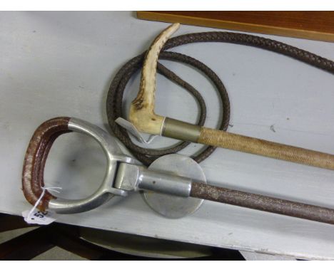 An Antler Handled Whip and a Shooting Stick 
