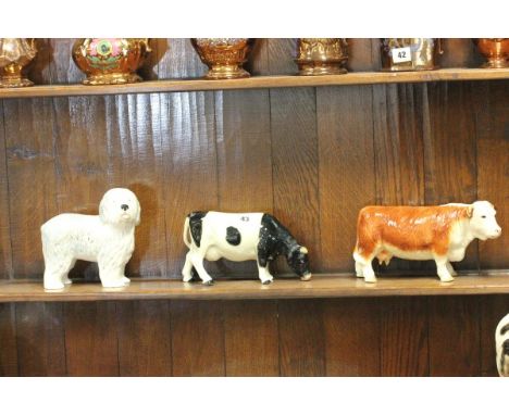 Two Ceramic Cows and a Sheepdog