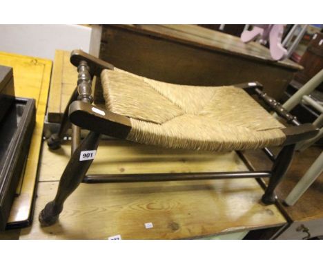 An Early 20th century Stool of Curved Form with string seat 