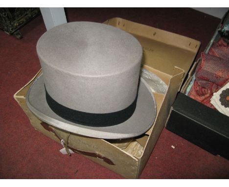 A Grey Top Hat, by Dunn & Co, gloves, etc, in original card box. 