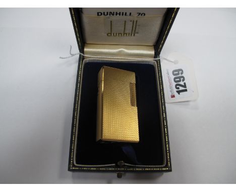 Dunhill: A "Dunhill 70" Gold Plated "Barley" Effect Lighter, all over textured design, in original box with instruction bookl
