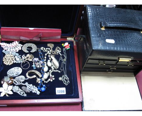 Costume Brooches, vintage bead necklaces, etc; together with a black travelling jewellery case.