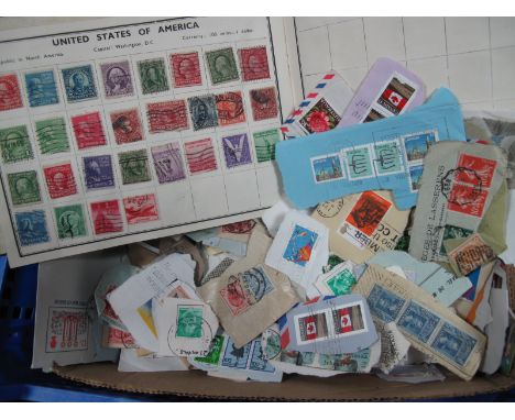 A Small Collection of G.B. Stamps on Paper, a few day first day covers and a small album of world wide stamps.