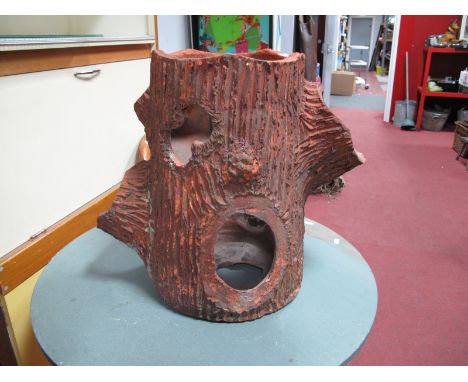A Terracotta Pottery Garden Planter, in the form of a tree trunk, with four protruding apertures and pierced openings, approx