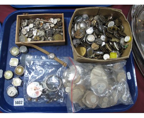 A Large Collection of Assorted Wristwatch Movements, dials, pocketwatch glasses, six vintage gent's wristwatch heads (no stra