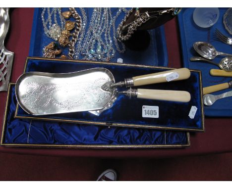 A XIX Century Presentation Trowel, with silver ferrule and ivorine handle (cased), a similar crumb scoop. (2)