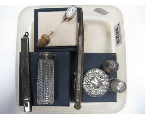 A Hallmarked Silver Engine Turned Pencil, "Yard-O-Led", a hallmarked silver topped glass scent bottle (damaged/lacking lid), 