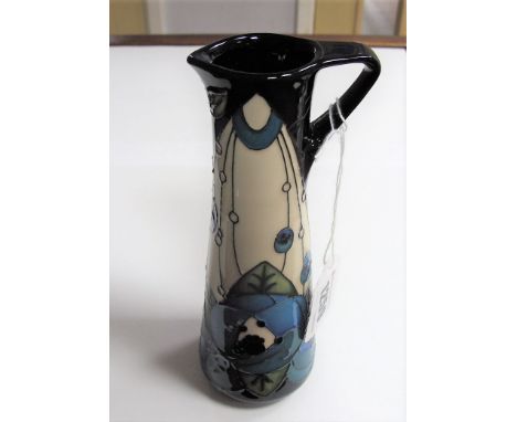 A Moorcroft Pottery Jug, decorated in the 'Rennie Rose' (blue) design by Rachel Bishop, first quality, impressed and painted 