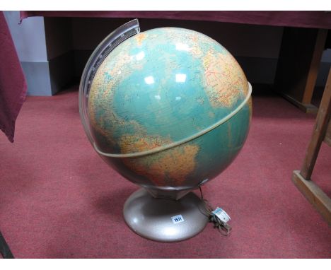 A 1966 'Illumina' World Globe, on metal stand by Purvell & Sons Ltd London, approximately 55mm high overall. 