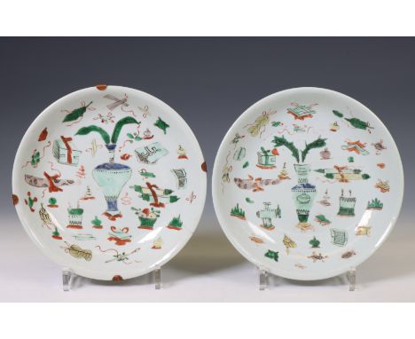 China, pair of famille verte porcelain plates, Kangxi period (1662-1722), decorated with antiquities and Buddhist symbols (su