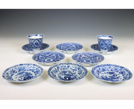 China, a set of two blue and white porcelain cups and five saucers and a set of three saucers, Kangxi period (1662-1722)-19th