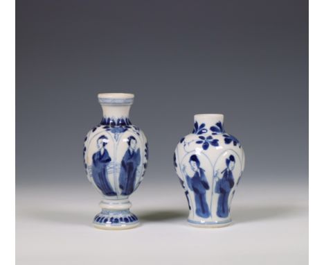 China, two small blue and white vases, Kangxi period (1662-1722), of various shape, both moulded with petal-shaped panels enc