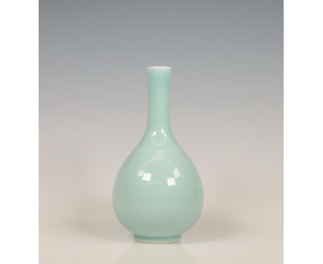 China, claire-de-lune-glazed bottle vase, 20th century, covered with an even pale green glaze thinning to white at the rim, t