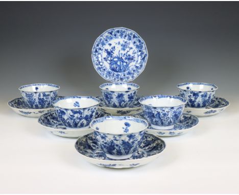 China, a set of six blue and white porcelain cups and seven saucers, Kangxi period (1662-1722), each of canted shape and deco