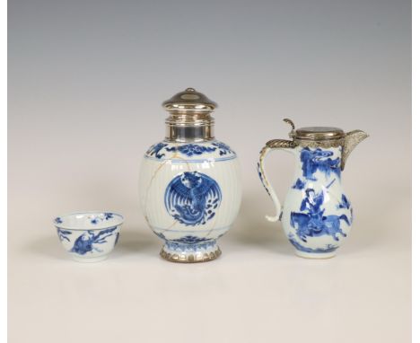 China, three blue and white porcelain objects, Kangxi period (1662-1722), the silver later, comprising a silver-mounted tea-c