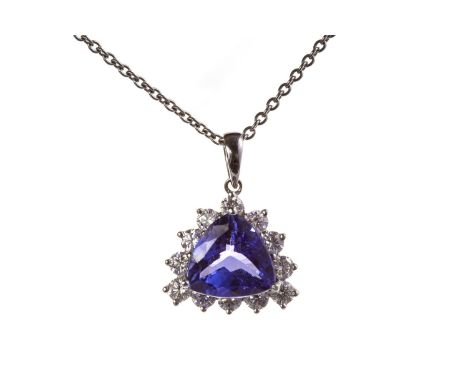 TANZANITE AND DIAMOND PENDANT, set with a central trilliant cut tanzanite 9mm wide, surrounded by diamonds, marked 750, on a 