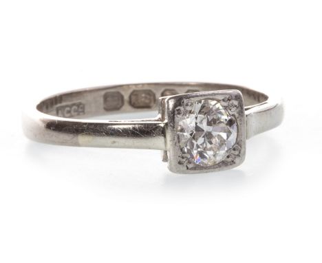 DIAMOND SOLITAIRE RING, set with a round brilliant cut diamond of approximately 0.25 carats to a square bezel 5.7mm wide, in 